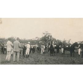 Jockeys in mounting area before horse-race at Fletcher Vale