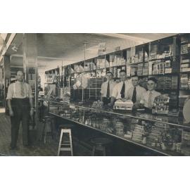 Stan Pollard with Four Staff behind the counter of his Gill Street Store