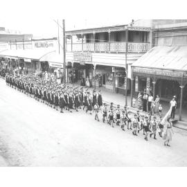 Boy Scouts and Blackheath students in ANZAC Day march, Gill Street, 1956
