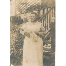Midwife with Gwen Davies as Baby, at Accrington house, York Street, 1925