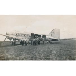 Arrival of Flour by RAAF DC3 Aircraft at the Corinda Airfield following floods, 1948