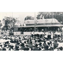 JD Cunningham addressing Victory Day celebrations, Lissner Park, 1945