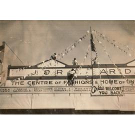 J & R Arida Store sign