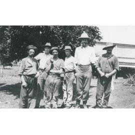 Group of men in working clothes