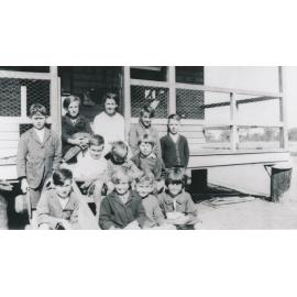School at Pumping Station, Weir - students on steps of verandah