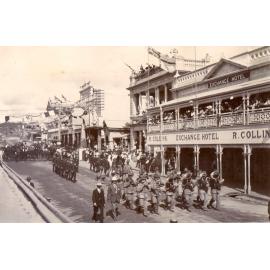 Parade turning into Mosman st from Gill st with marching band