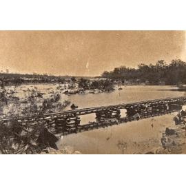 Low-level rail bridge over a river