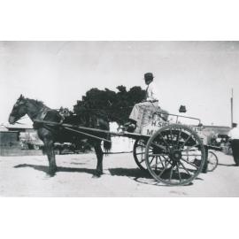 Harold Siemon in delivery cart