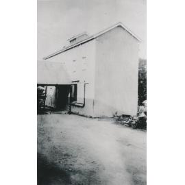 Two storey shed at back of Siemon’s store, where seed crusher operated