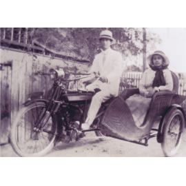 George Hosking and Beatrice Siemon on motorcycle and sidecar