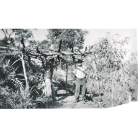 Two men at a mine at Upper Cape goldfield