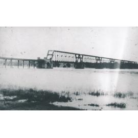 Macrossan Rail Bridge during flood