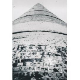 Close view looking up at the Chimney, Towers Hill