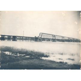 Burdekin River in flood at rail-bridge Macrossan