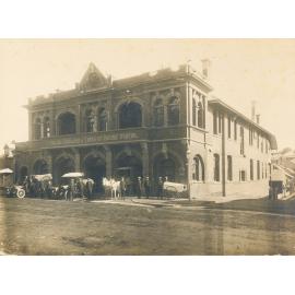 Ambulance bearers, horse and carts and early model Ambulance motor vehicles outside the Qld Ambulance and Transport Brigade Hospital, Brisbane