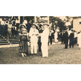 Spectators including J "Bluey" Ward, at the Racecourse