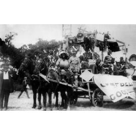 Black-face Musicians on horse drawn Procession float