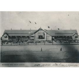 Richmond Hill State School with large crowd in front