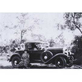 Margaret Tolano & Anne Tolano sitting on Phil Tolano’s 1929 Buick