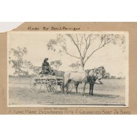 A Homemade Buckboard Cart With a Galvanised Boat on Board