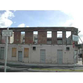 Series of photos of interior of fire damaged Excelsior Hotel before restoration