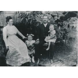 Horace & Harriet Wooster with their children Edna (Norma?) and Horace in Backyard