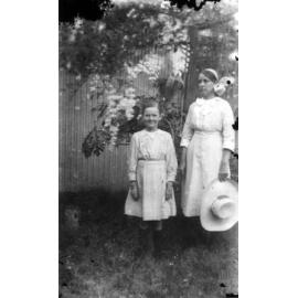 Edna Wooster with Unknown Older Girl in Backyard?