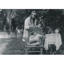 Two Unknown girls playing in Backyard