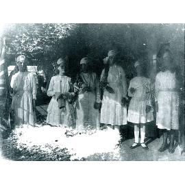 Comfort Fund girls holding flags and possibly knitted socks