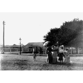 Group of Women and Children in Street possibly near Lissner Park?