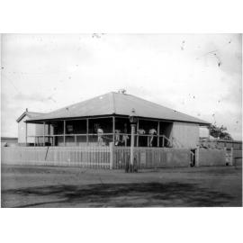 Old Post Office with group of men on verandah in Croydon