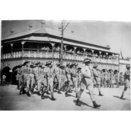 School Cadets Marching in Anzac Day in Front of Excelsior Hotel