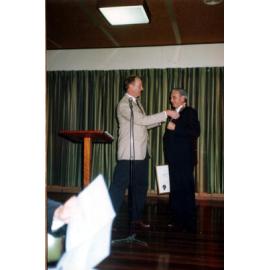Ken Sellars being presented with Paul Harris Award, Rotary