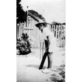 Ken Sellars playing backyard cricket Aged 12 Years