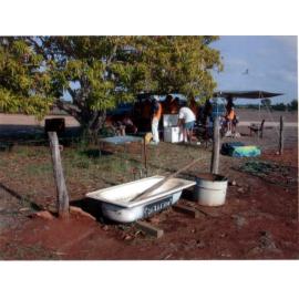 Team under a shade shelter at the 2003 Goldfield Ashes